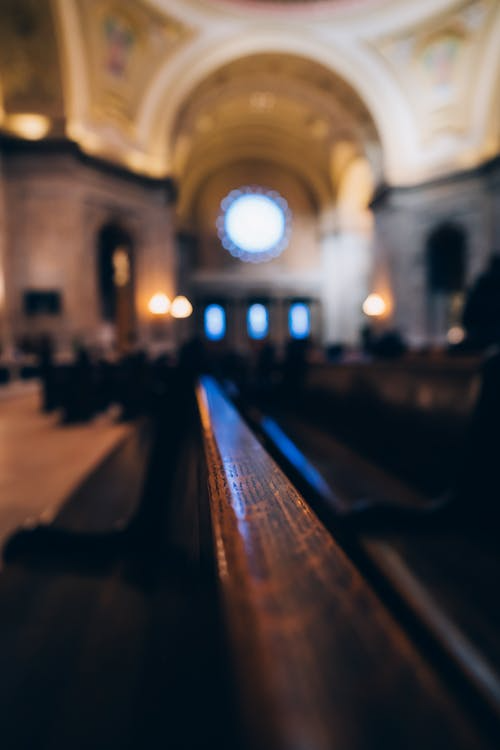 An image of a bench in a church.