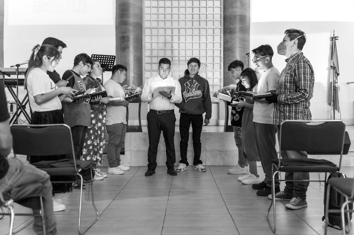 An image of people praying in a church.