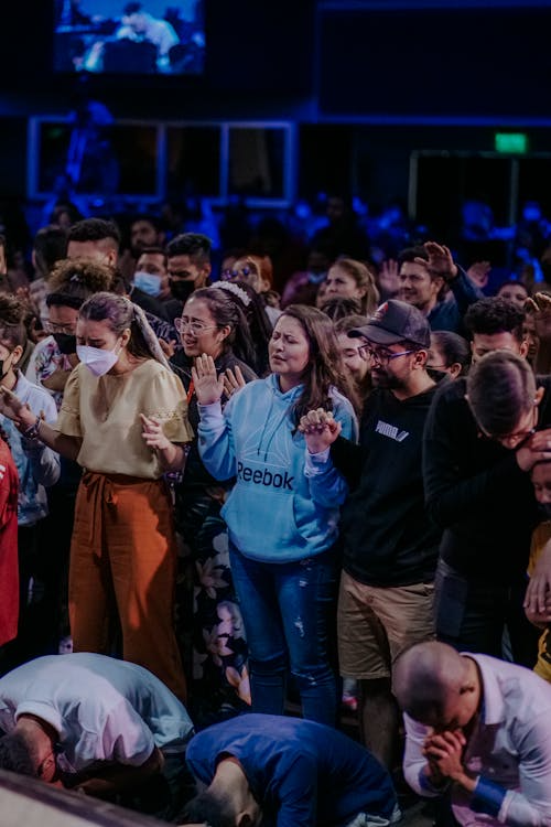 An image of people praying together